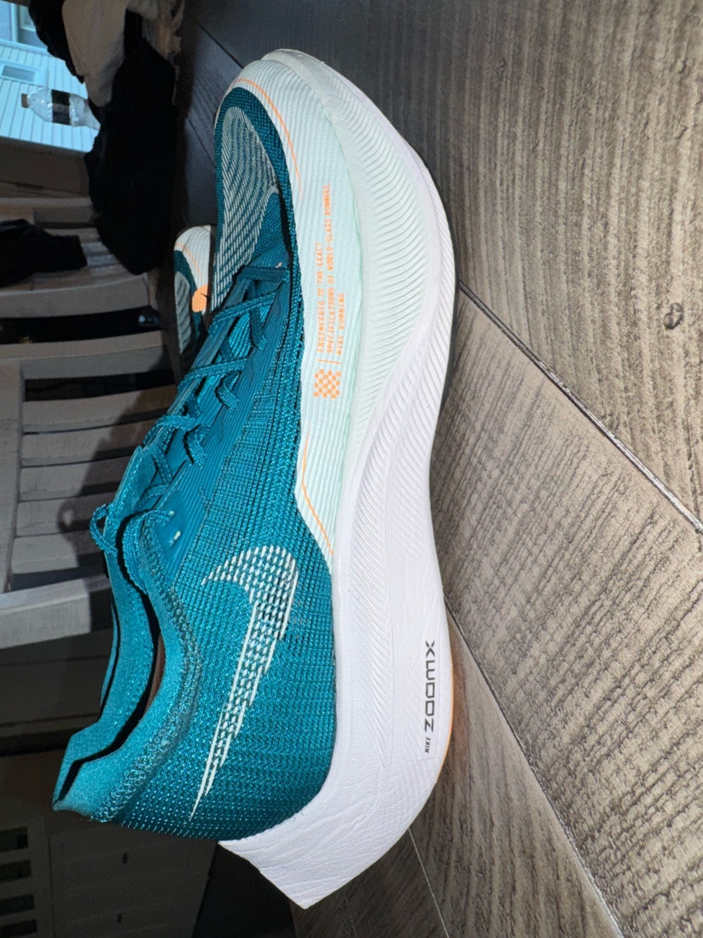 Nike Teal and Light Blue Men’s ZoomX Running Shoe with Orange Accents
